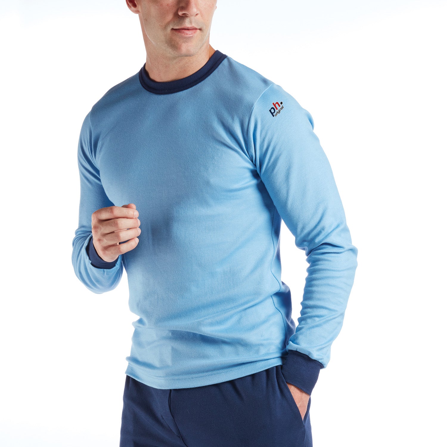 Person wearing a blue long-sleeve athletic shirt with a brand logo on a white background