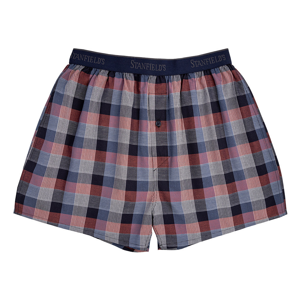 Plaid boxer shorts with a visible brand label on a white background